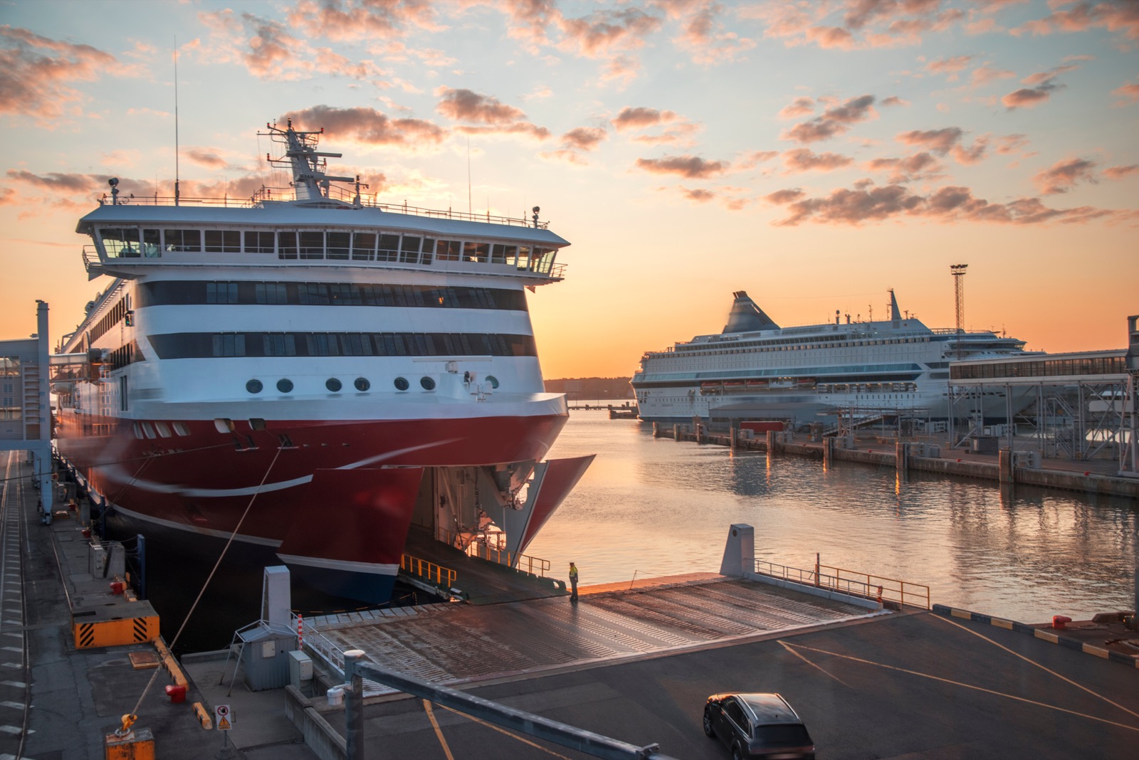 Ferries docked at sunset